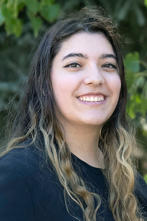 Portrait of Sofia smiling outdoors, dental assistant at Gunbarrel Family Dentistry